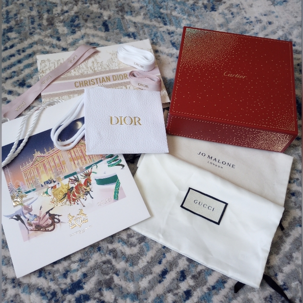 Dior, Cartier,Gucci, Jo Malone gift bags.